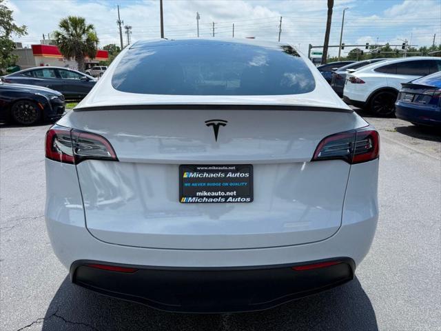 used 2023 Tesla Model Y car, priced at $31,871
