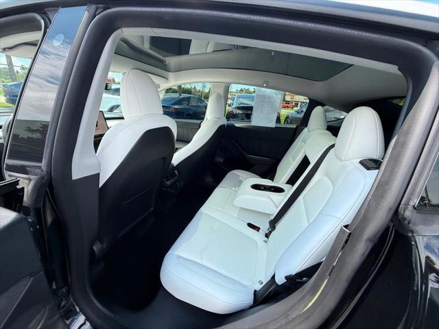 used 2023 Tesla Model Y car, priced at $31,871