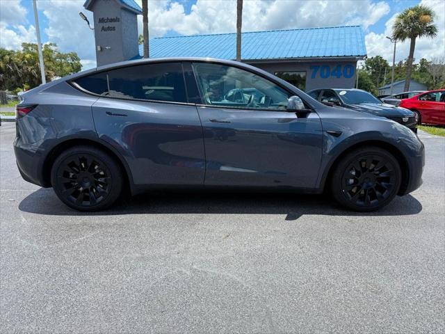 used 2023 Tesla Model Y car, priced at $30,991