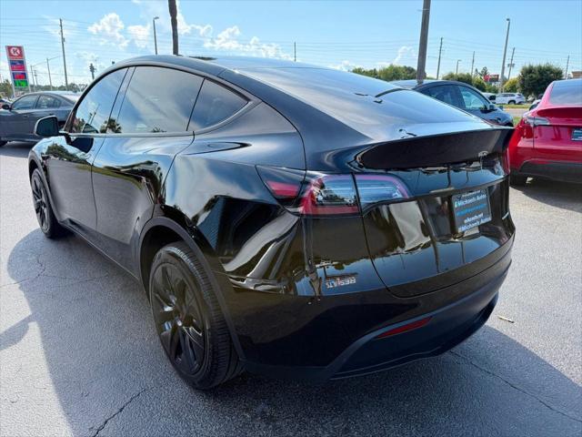 used 2023 Tesla Model Y car, priced at $30,991
