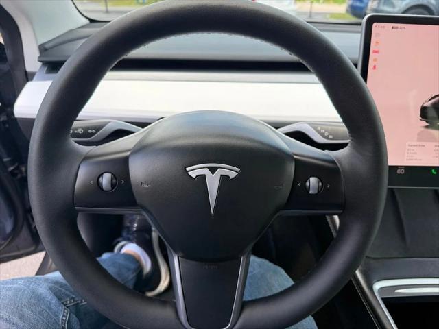 used 2023 Tesla Model 3 car, priced at $27,691