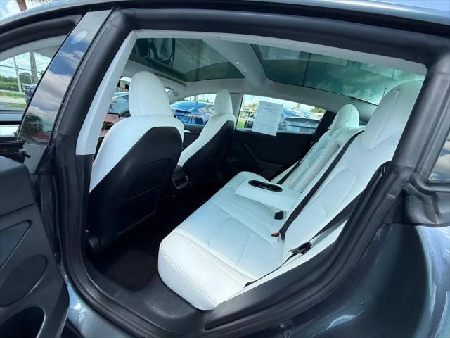 used 2023 Tesla Model 3 car, priced at $27,691