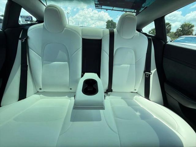 used 2023 Tesla Model 3 car, priced at $27,691
