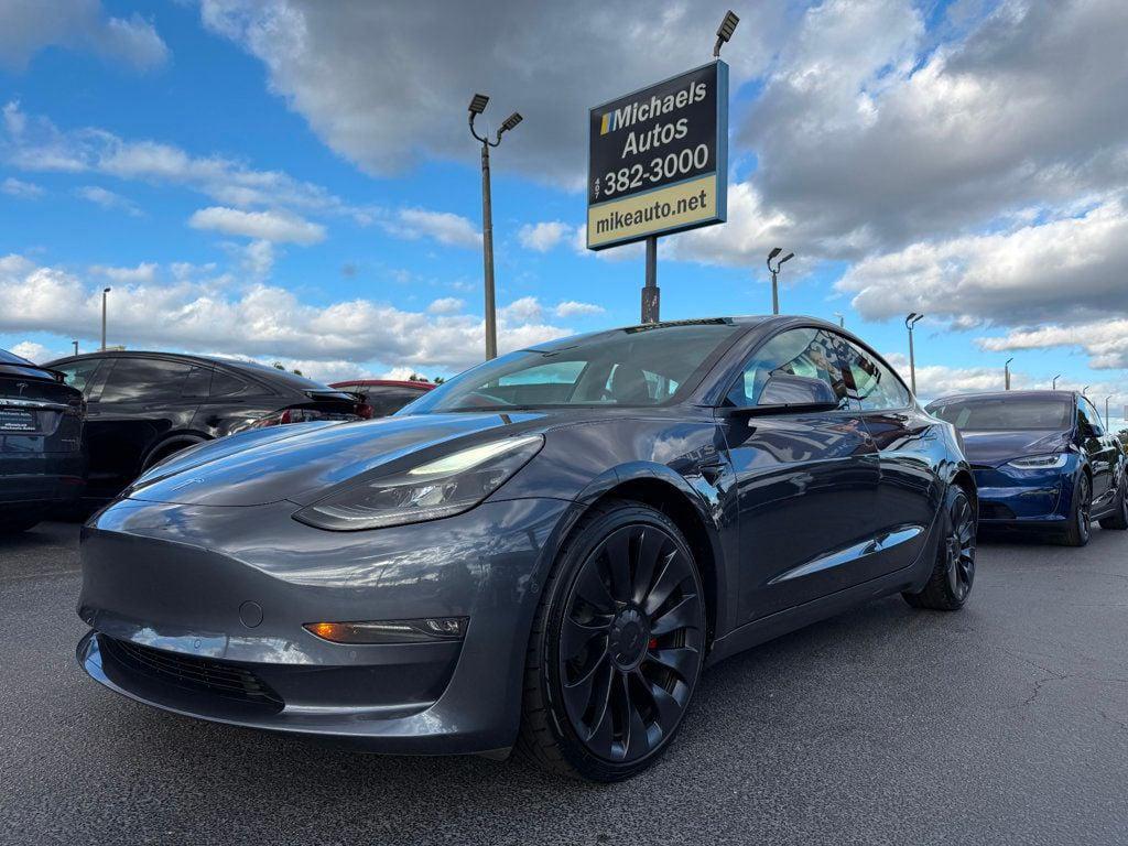 used 2022 Tesla Model 3 car, priced at $27,919