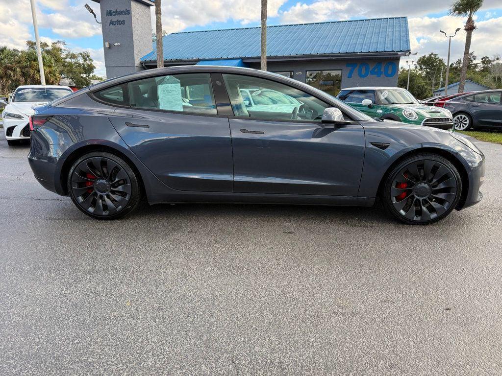used 2022 Tesla Model 3 car, priced at $27,919