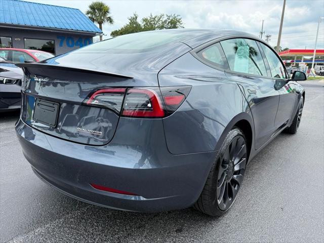 used 2023 Tesla Model 3 car, priced at $35,791