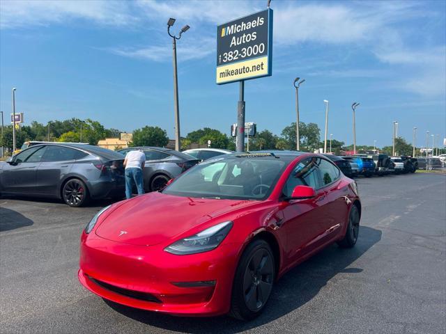 used 2023 Tesla Model 3 car, priced at $32,691
