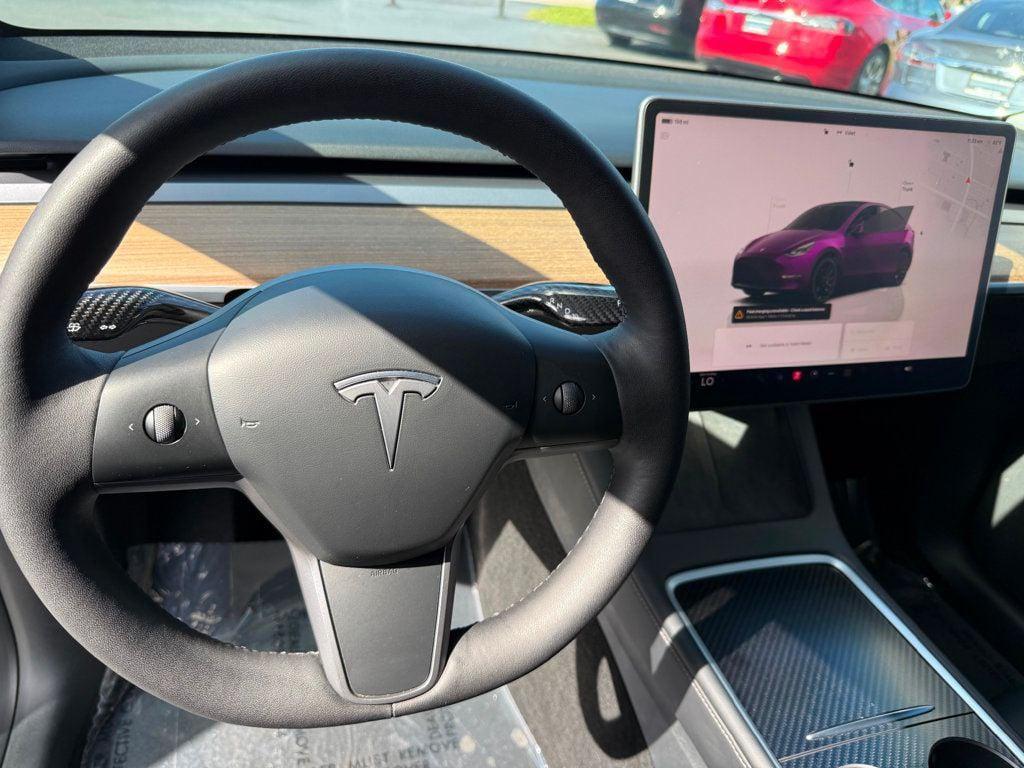 used 2023 Tesla Model Y car, priced at $25,991