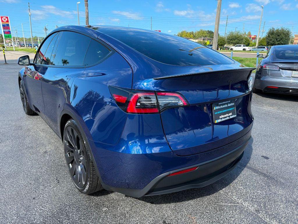 used 2023 Tesla Model Y car, priced at $25,991
