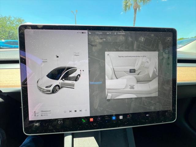 used 2022 Tesla Model 3 car, priced at $27,691