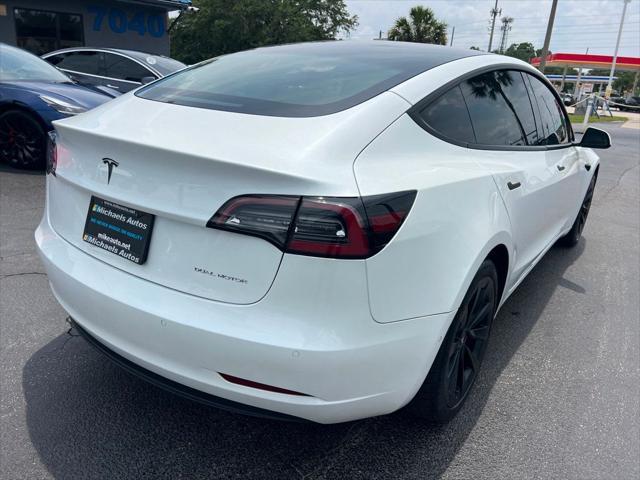 used 2022 Tesla Model 3 car, priced at $27,691