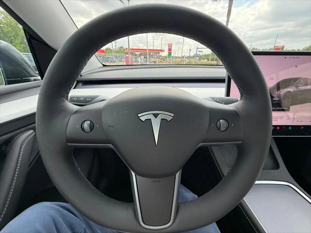 used 2024 Tesla Model Y car, priced at $34,891