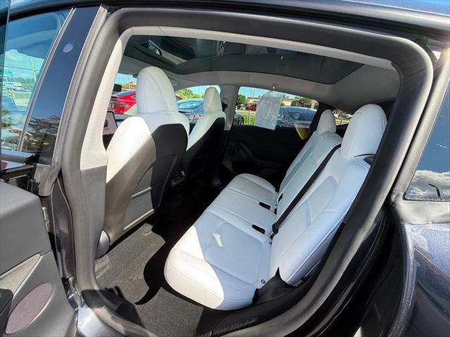used 2024 Tesla Model Y car, priced at $34,891