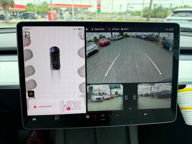 used 2024 Tesla Model Y car, priced at $34,891