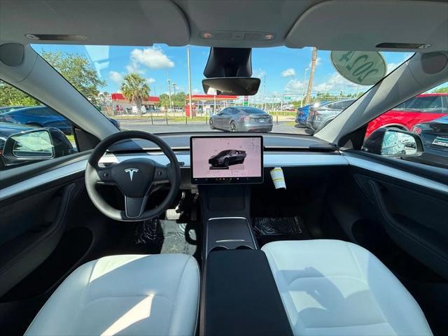 used 2024 Tesla Model Y car, priced at $34,891