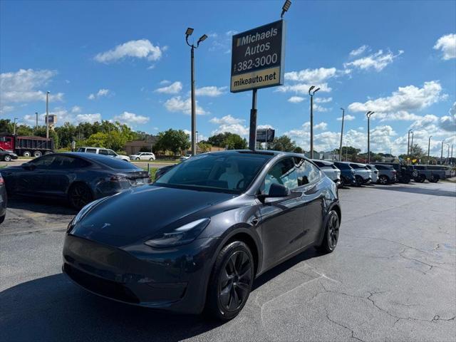 used 2024 Tesla Model Y car, priced at $34,891
