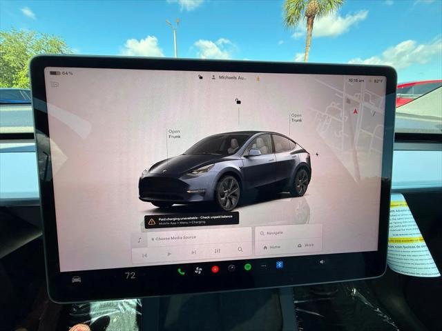 used 2024 Tesla Model Y car, priced at $34,891