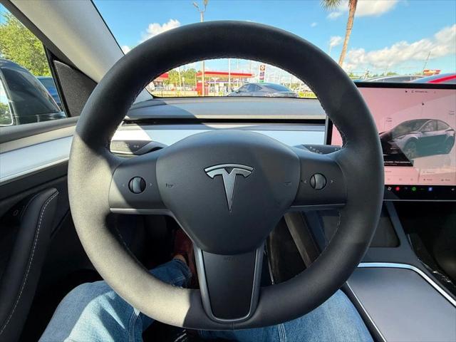 used 2024 Tesla Model Y car, priced at $34,891