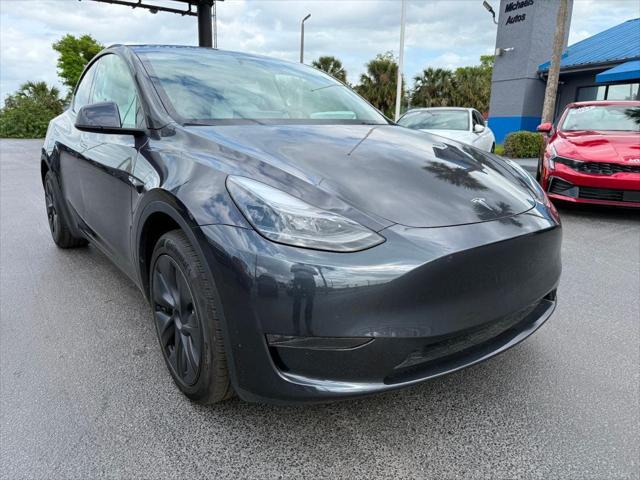 used 2024 Tesla Model Y car, priced at $34,891