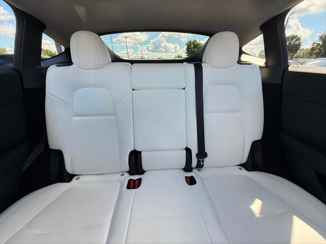 used 2024 Tesla Model Y car, priced at $34,891