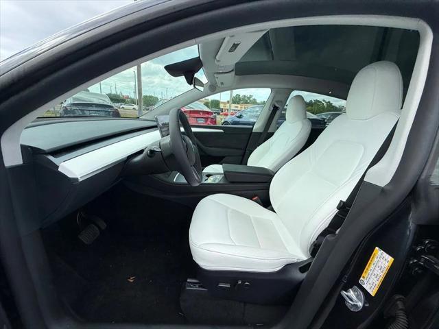 used 2024 Tesla Model Y car, priced at $34,891