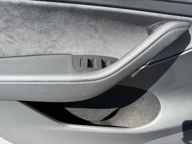 used 2024 Tesla Model Y car, priced at $34,891