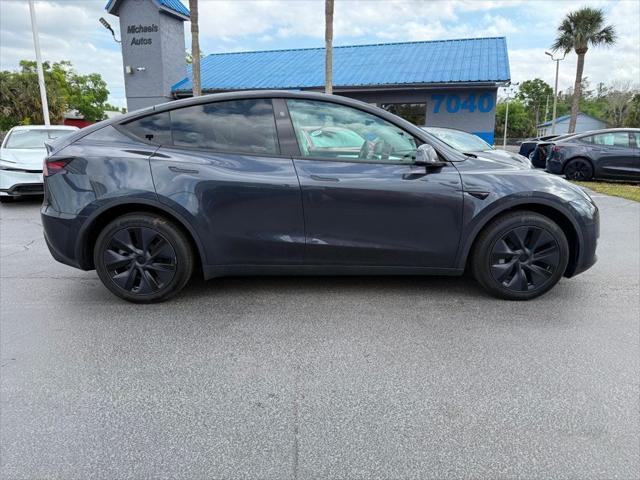 used 2024 Tesla Model Y car, priced at $34,891