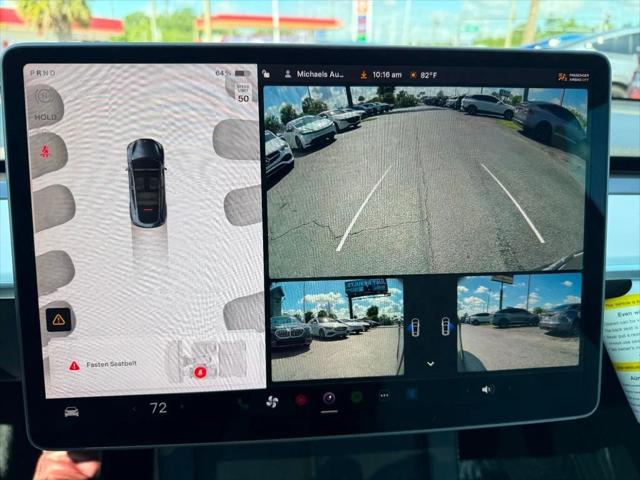 used 2024 Tesla Model Y car, priced at $34,891