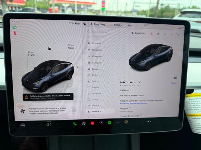 used 2024 Tesla Model Y car, priced at $34,891