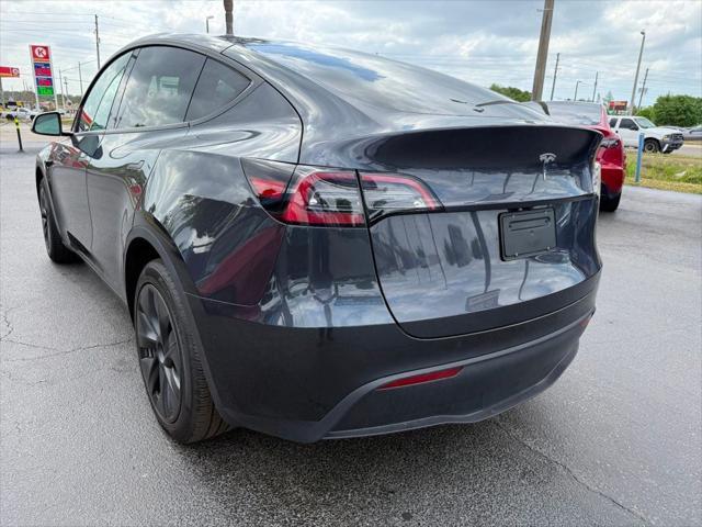 used 2024 Tesla Model Y car, priced at $34,891