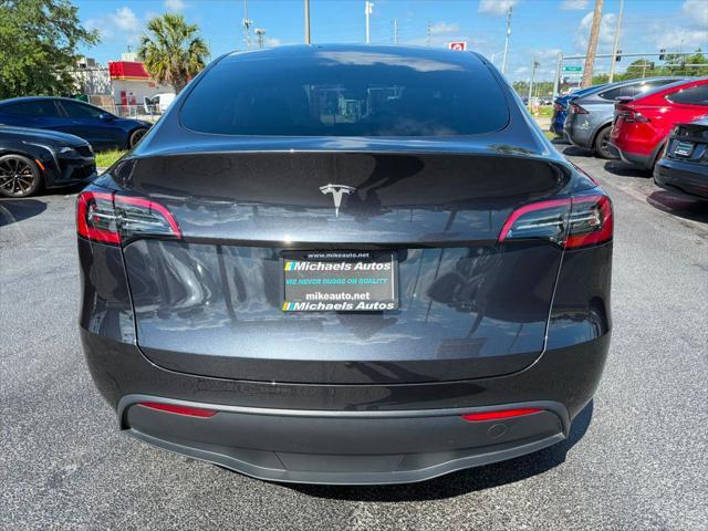 used 2024 Tesla Model Y car, priced at $34,891