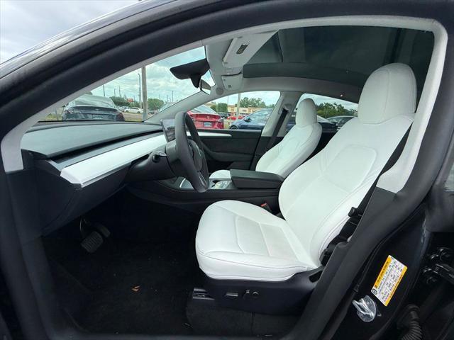 used 2024 Tesla Model Y car, priced at $34,891