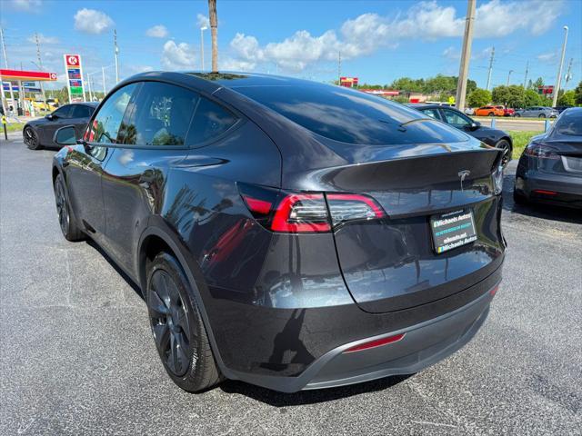 used 2024 Tesla Model Y car, priced at $34,891