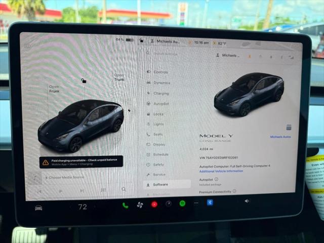 used 2024 Tesla Model Y car, priced at $34,891