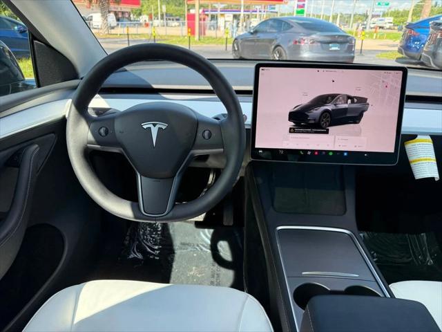 used 2024 Tesla Model Y car, priced at $34,891