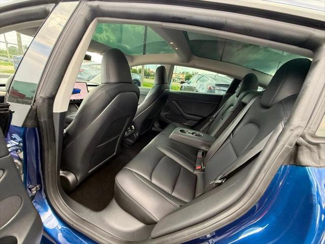 used 2023 Tesla Model 3 car, priced at $33,991