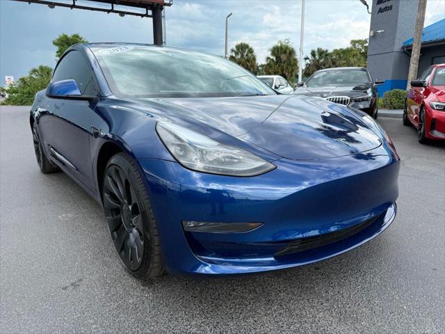 used 2023 Tesla Model 3 car, priced at $34,941