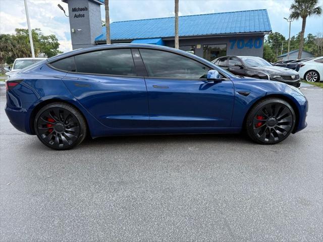 used 2023 Tesla Model 3 car, priced at $34,941