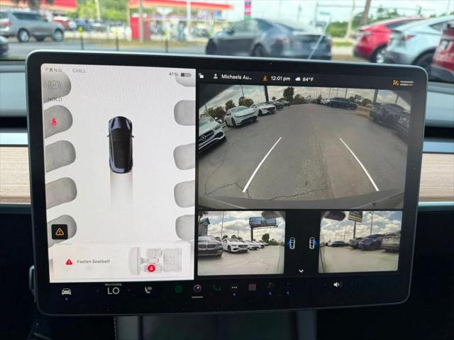 used 2023 Tesla Model 3 car, priced at $25,991