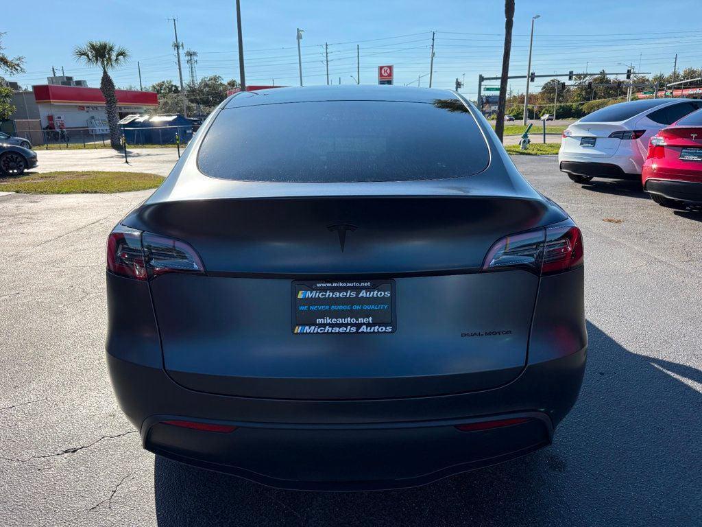 used 2024 Tesla Model Y car, priced at $36,991