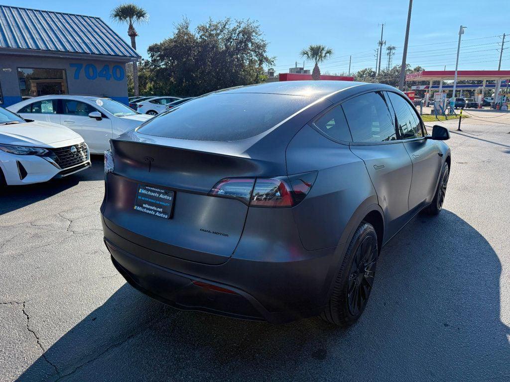 used 2024 Tesla Model Y car, priced at $36,991