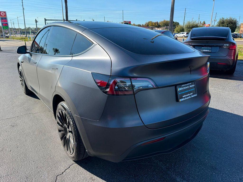 used 2024 Tesla Model Y car, priced at $36,991