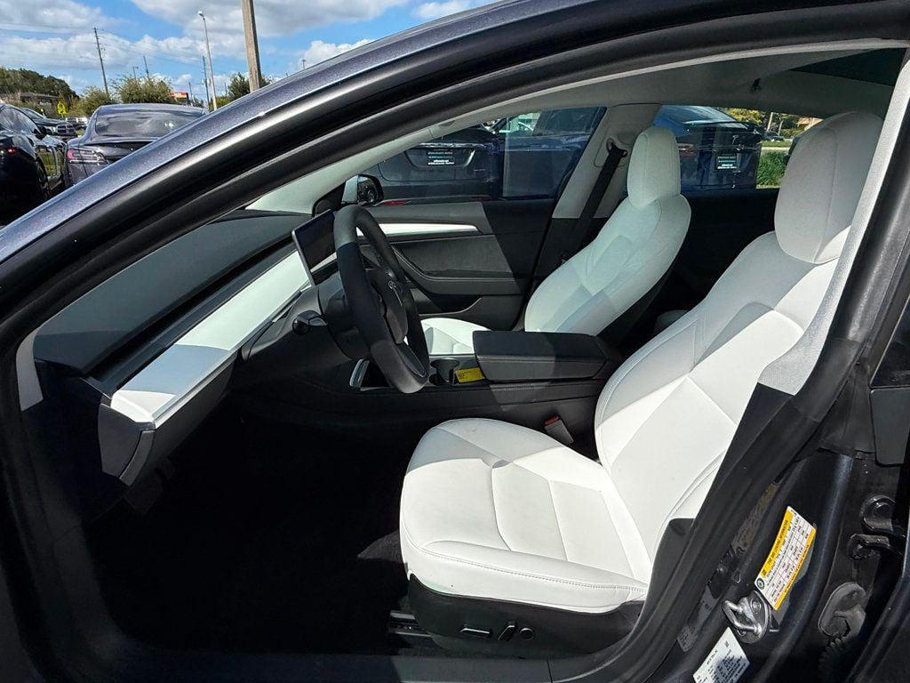 used 2023 Tesla Model 3 car, priced at $27,691