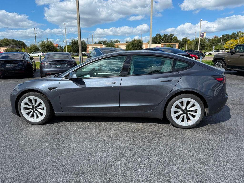 used 2023 Tesla Model 3 car, priced at $27,691