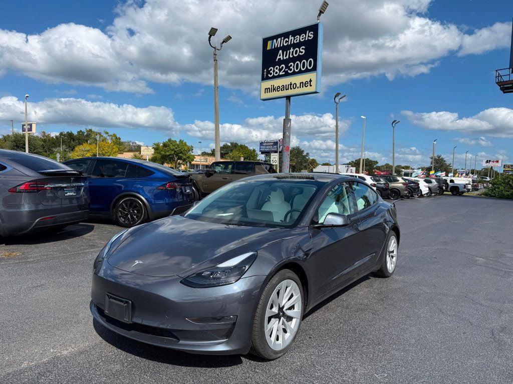 used 2023 Tesla Model 3 car, priced at $27,691