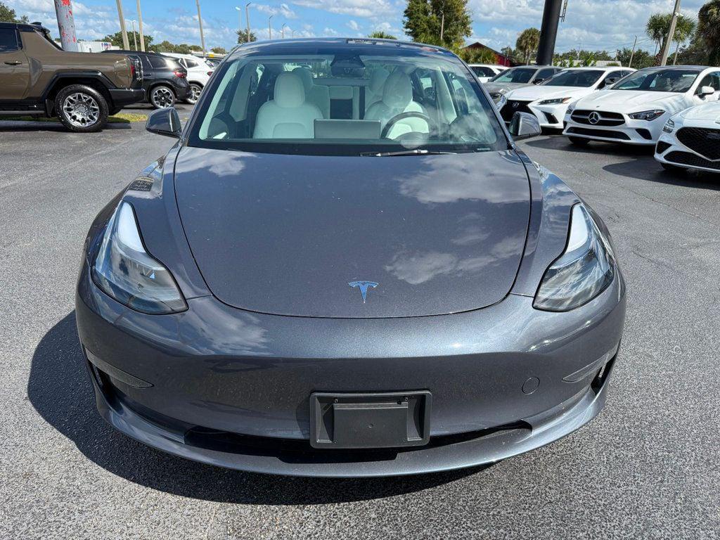 used 2023 Tesla Model 3 car, priced at $27,691