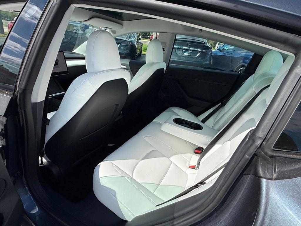 used 2023 Tesla Model 3 car, priced at $27,691