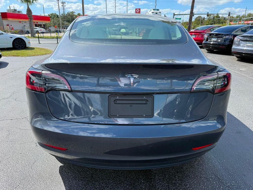 used 2023 Tesla Model 3 car, priced at $27,691