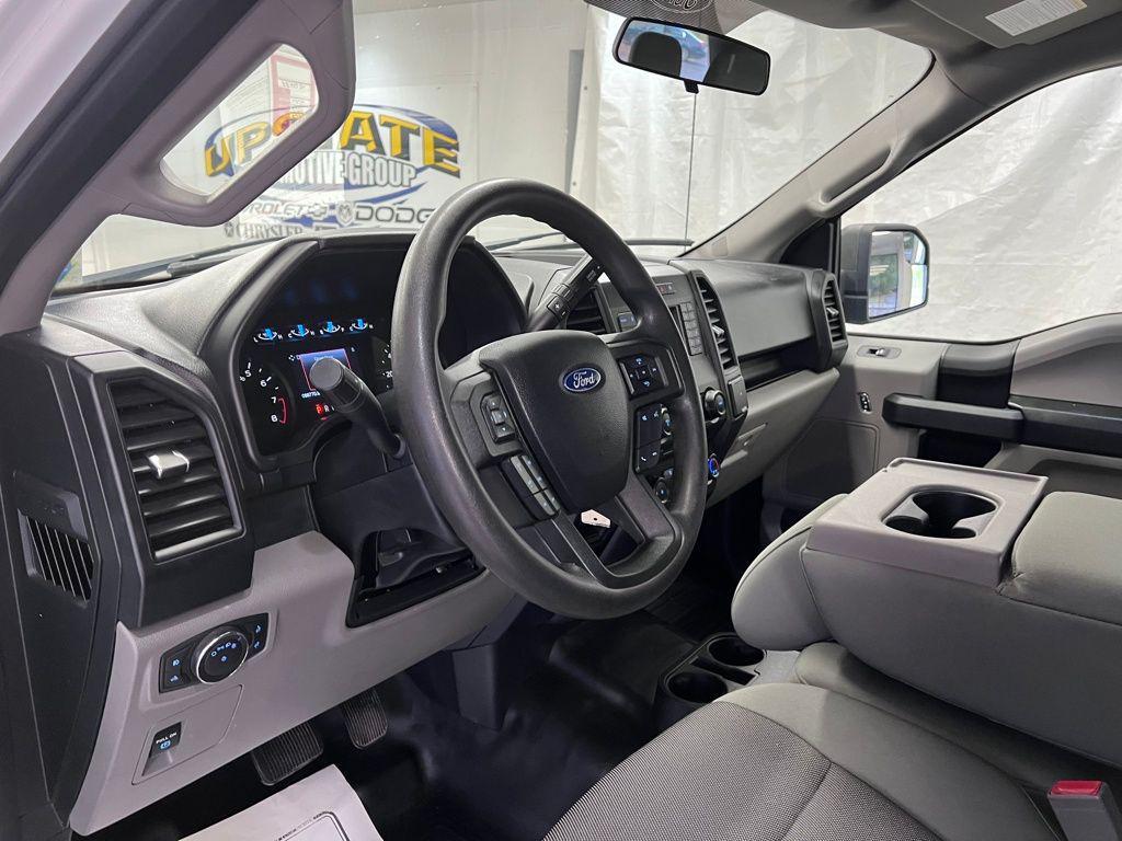 used 2018 Ford F-150 car, priced at $25,061