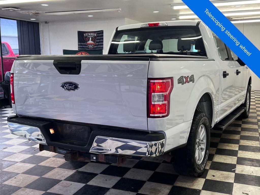 used 2018 Ford F-150 car, priced at $25,061
